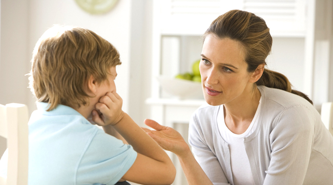 Mother having discussion with son